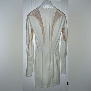 Authentic ivory Mugler dress,size 34. Worn for 2 hours. In very great condition.